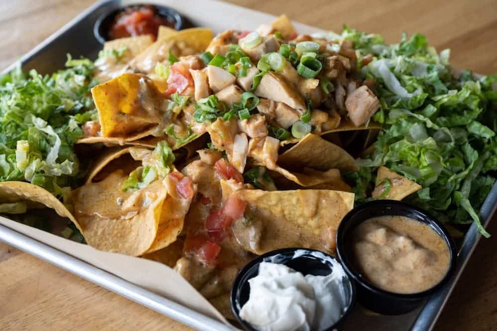 Nachos with cheese and chicken Nachos with cheese and chicken